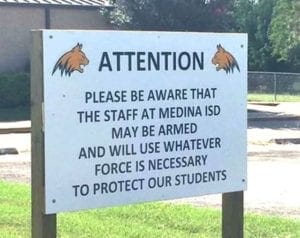 Armed School Sign