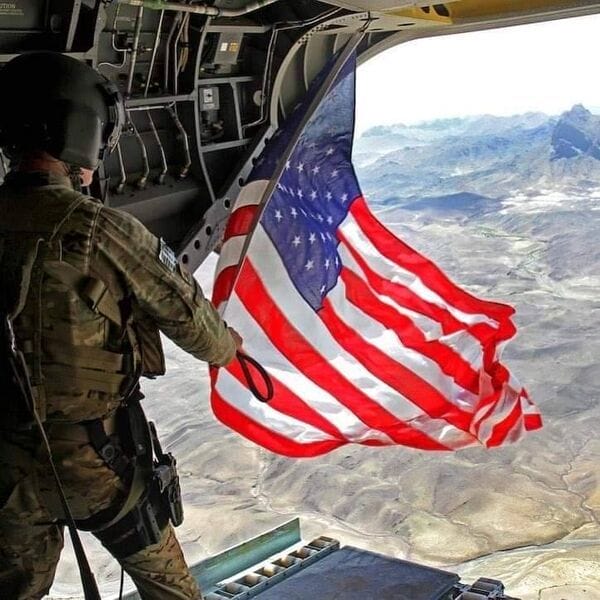 American flag unfurled inside military plane