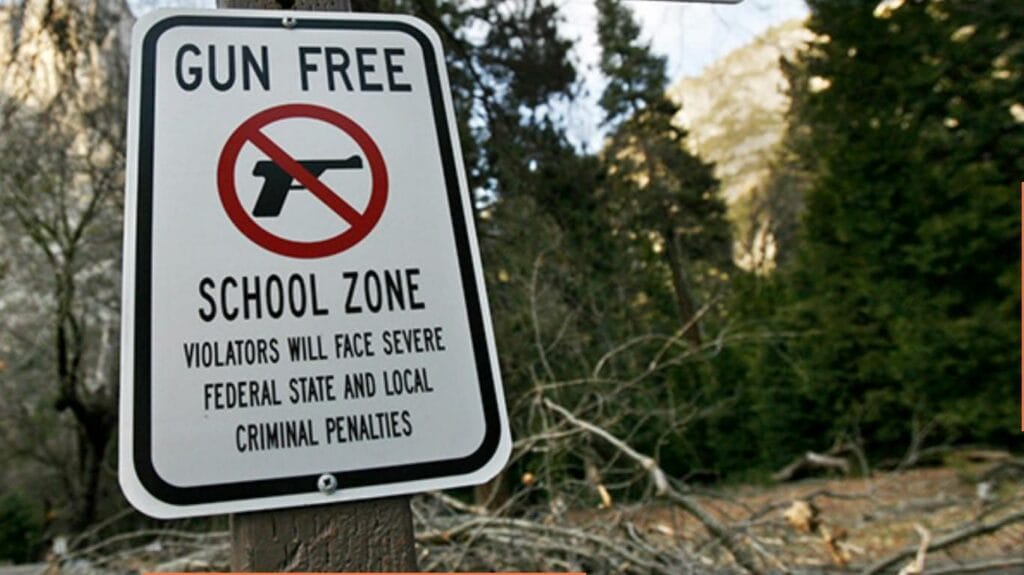 Gun free school zone sign in the woods