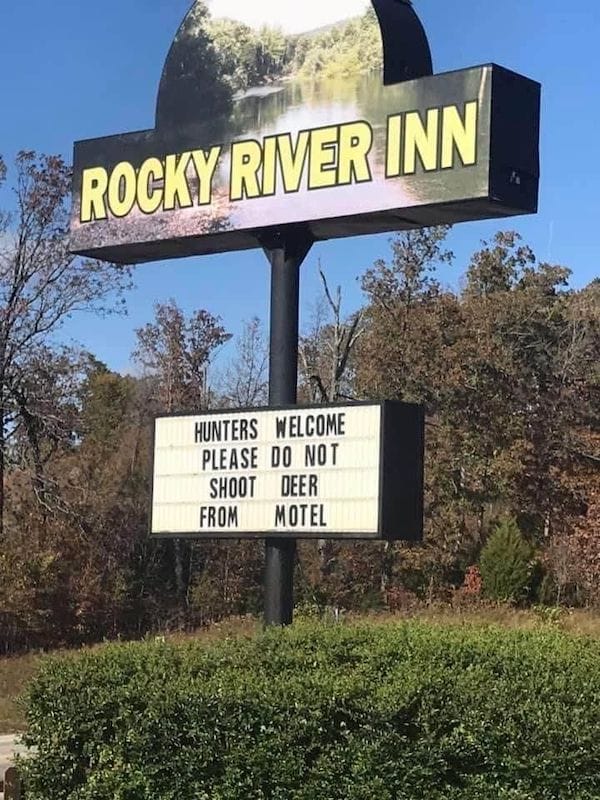 Hotel with "hunters welcome" sign