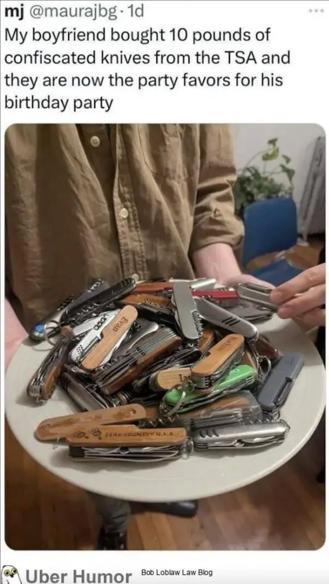 Person holding a plate filled with various confiscated pocket knives, intended as party favors, as mentioned in the accompanying tweet.